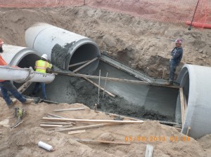 intersecting underground pipe construction technique