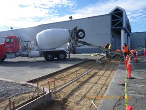 pouring concrete at world's gym in high desert